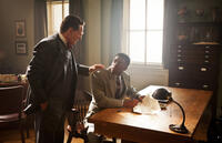 Harrison Ford as Branch Rickey and Chadwick Boseman as Jackie Robinson in "42."
