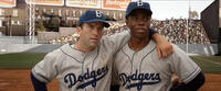 Lucas Black as Pee Wee Reese and Chadwick Boseman as Jackie Robinson in "42."