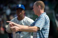Chadwick Boseman and director Brian Helgeland on the set of "42."