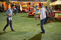 Taylor Lautner as Frat Boy Andy and Adam Sandler as Lenny Feder in "Grown Ups 2."