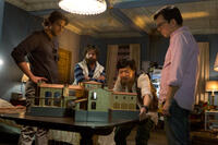 Bradley Cooper as Phil, Zach Galifianakis as Alan, Ken Jeong as Mr. Chow and Ed Helms as Stu in "The Hangover Part III."