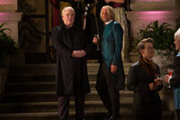 Philip Seymour Hoffman as Plutarch Heavensbee and Woody Harrelson as Haymitch Abernathy in "The Hunger Games: Catching Fire."