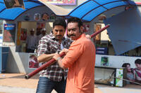 Abhishek Bachchan and Ajay Devgn in "Bol Bachchan."