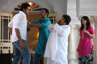 Abhishek Bachchan, Ajay Devgn and Prachi in "Bol Bachchan."