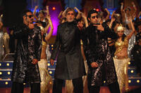 Ajay Devgn, Amitabh Bachchan and Abhishek Bachchan in "Bol Bachchan."