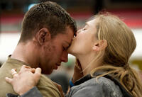Aaron Johnson as Ford Brody and Elizabeth Olsen as Elle Brody in "Godzilla."
