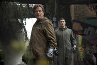 Bryan Cranston as Joe Brody and Aaron Taylor-Johnson as Ford Brody in "Godzilla."