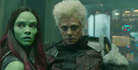 Zoe Saldana as Gamora and Benicio Del Toro as The Collector in "Guardians of the Galaxy."