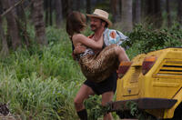 Mena Suvari as Tonya and Rob Schneider as Ernesto in "You May Not Kiss the Bride."