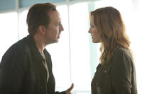 Nicolas Cage as Will Montgomery and Malin Akerman as Riley Jeffers in "Stolen."