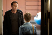 Nicolas Cage as Will Montgomery and Sami Gayle as Alison Loeb in "Stolen."
