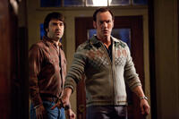 Ron Livingston as Roger Perron and Patrick Wilson as Ed Warren in "The Conjuring."