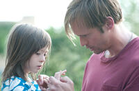 Onata Aprile as Maisie and Alexander Skarsgard as Lincoln in "What Maisie Knew."