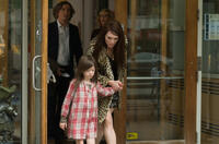 Onata Aprile as Maisie and Julianne Moore as Susanna in "What Maisie Knew."