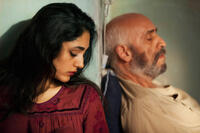 Golshifteh Farahani as the Woman and Hamidreza Javdan as the Man in "The Patience Stone."