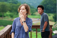 Isabelle Huppert and Yu Junsang in "In Another Country."