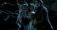 Isabelle Nelisse, Nikolaj Coster-Waldau, Megan Charpentier and Jessica Chastain in "Mama."