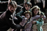 Nikolaj Coster-Waldau, Jessica Chastain, Megan Charpentier and Isabelle Nelisse in "Mama."
