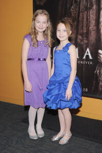 Megan Charpentier and Isabelle Nelisse at the New York premiere of "Mama."