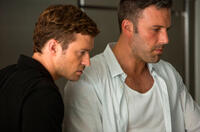 Justin Timberlake as Richie Furst and Ben Affleck as Ivan Block in "Runner, Runner."