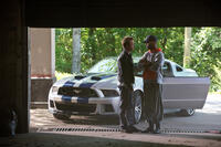 Aaron Paul and Scott "Kid Cudi" Mescudi in "Need For Speed."