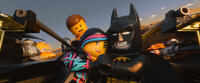 Emmet voiced by Chris Pratt, Wyldstyle voiced by Elizabeth Banks and Batman voiced by Will Arnett in "The LEGO Movie."