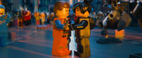 Benny voiced by Charlie Day, Emmet voiced by Chris Pratt and Wyldstyle voiced by Elizabeth Banks in "The LEGO Movie."