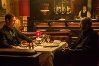 Marton Csokas as Teddy and Denzel Washington as Robert McCall in "The Equalizer."