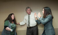 Melissa McCarthy, Thomas F. Wilson and Sandra Bullock in "The Heat."