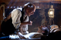 Tom Hanks as Dr. Goose and Jim Sturgess as Adam Ewing in "Cloud Atlas."