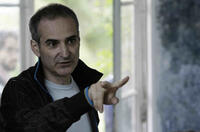 Director Olivier Assayas on the set of "Something in the Air."