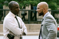 Michael Kenneth Williams as detective Holloway and Common as Vincent in "Luv."