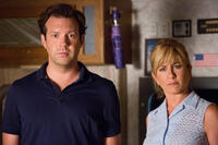 Jason Sudeikis as David Clark and Jennifer Aniston as Rose O'Reilly in "We're the Millers."