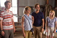 Will Poulter as Kenny Rossmore, Jennifer Aniston as Rose O'Reilly, Jason Sudeikis as David Clark and Emma Roberts in "We're the Millers."