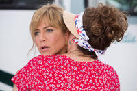 Jennifer Aniston as Rose O'Reilly and Kathryn Hahn as Edie Fitzgerald in "We're the Millers."