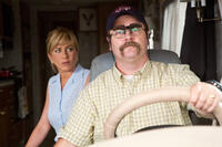 Jennifer Aniston as Rose O'Reilly and Nick Offerman as Don Fitzgeral in "We're the Millers."