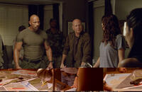 Dwayne Johnson as Roadblock and Bruce Willis as Colton in "G.I. Joe: Retaliation 3D."