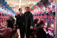 Tao Okamoto as Mariko and Hugh Jackman as Logan in "The Wolverine."