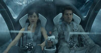 Olga Kurylenko and Tom Cruise in "Oblivion."