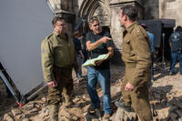 John Goodman, director George Clooney and Jean Dujardin on the set of "The Monuments Men."