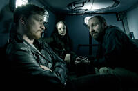 James McAvoy as Max Lewinsky, Andrea Riseborough as Sarah Hawks and Johnny Harris as Warns in "Welcome to the Punch."