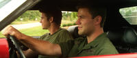 Liam Hemsworth and Austin Stowell in "Love and Honor."