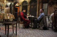 Riz Ahmed as Changez Khan and Liev Schreiber as Bobby Lincoln in "The Reluctant Fundamentalist."