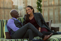 Djimon Hounsou as Quinton and Paula Patton as Montana Moore in "Baggage Claim."