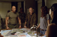 Dwayne Johnson as Roadblock and Bruce Willis as General Joe Colton in "G.I. Joe: Retaliation."