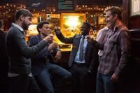 David Greenman as Isaac, Michael Ealy as Danny, Kevin Hart as Bernie and Bryan Callen as Trent in "About Last Night."