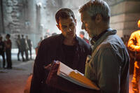 Director Neil Burger and Theo James on the set of "Divergent."