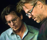 Johnny Depp and director Wally Pfister on the set of "Transcendence."