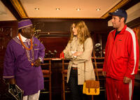 Abdoulaye Ngom as Mfana, Drew Barrymore as Lauren and Adam Sandler as Jim in "Blended."