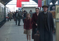 Sophie Nelisse as Liesel, Emily Watson as Rosa and Geoffrey Rush as Hans in "The Book Thief."